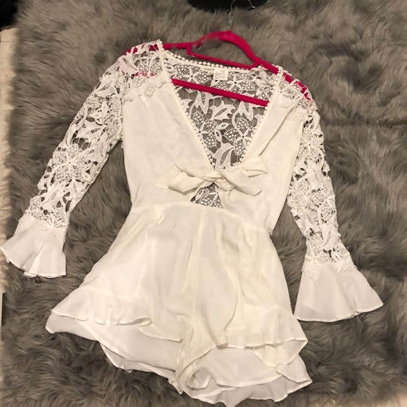 Cotton Candy Dresses & Skirts - NEW- White Deep V Lace Bell Sleeve Romper 💕